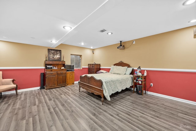 bedroom featuring light hardwood / wood-style flooring