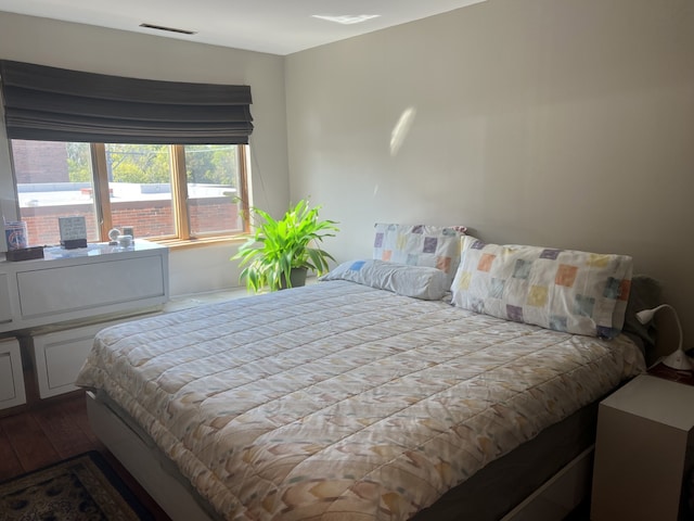 bedroom with light hardwood / wood-style floors