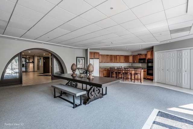 view of carpeted dining space