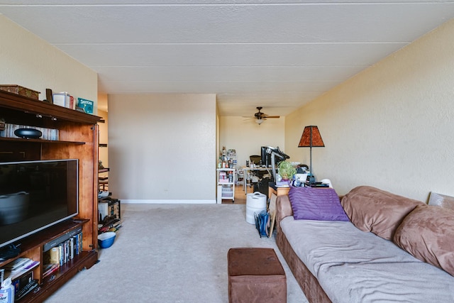 living room featuring carpet flooring and ceiling fan