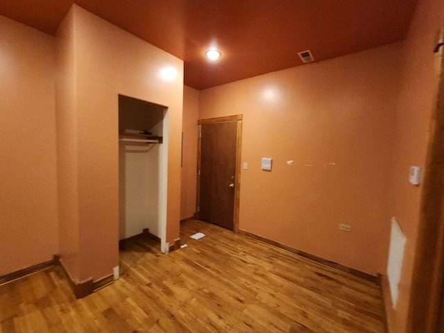 interior space featuring a closet and wood-type flooring