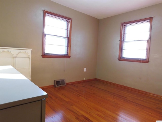 interior space with hardwood / wood-style flooring