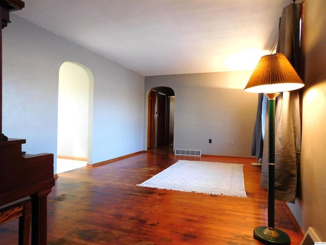 living room with dark wood-type flooring