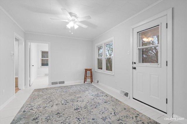 entryway featuring crown molding and ceiling fan