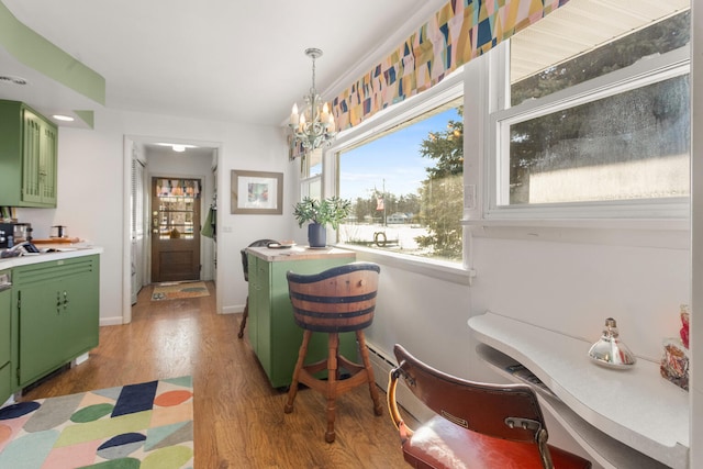 442 Wolfe Dr, Loda, IL 60948 - dining area with wood finished floors, a desk, and a chandelier