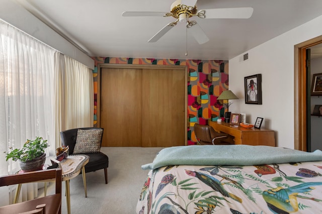 442 Wolfe Dr, Loda, IL 60948 - bedroom featuring carpet flooring, a ceiling fan, and a closet
