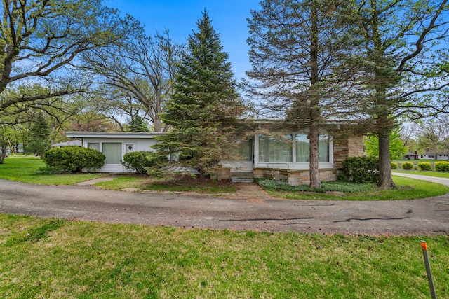 442 Wolfe Dr, Loda, IL 60948 - obstructed view of property with a front yard and stone siding