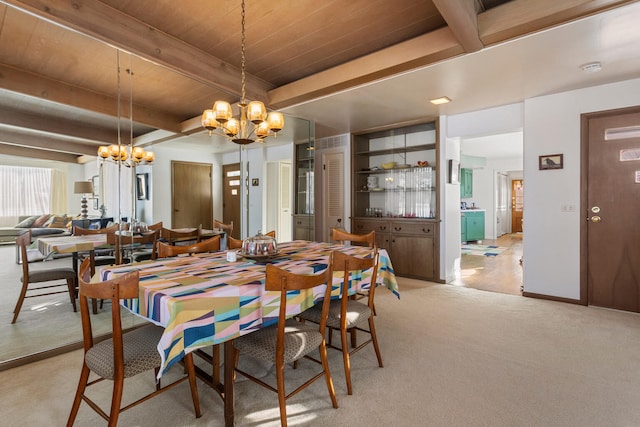 442 Wolfe Dr, Loda, IL 60948 - dining room featuring a chandelier, light carpet, beamed ceiling, and wooden ceiling