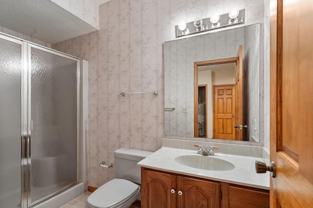 full bathroom featuring wallpapered walls, baseboards, toilet, vanity, and a shower stall