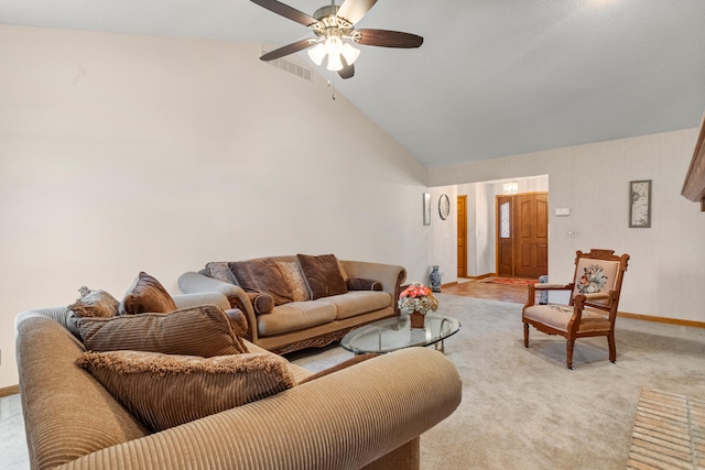 living room with visible vents, baseboards, a ceiling fan, light colored carpet, and high vaulted ceiling