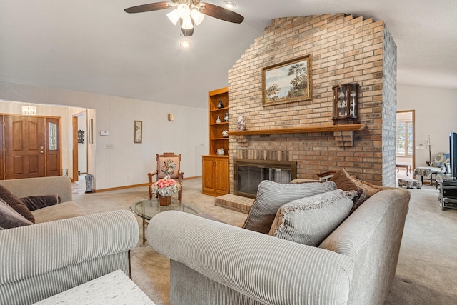 living area with a brick fireplace, light colored carpet, vaulted ceiling, and baseboards