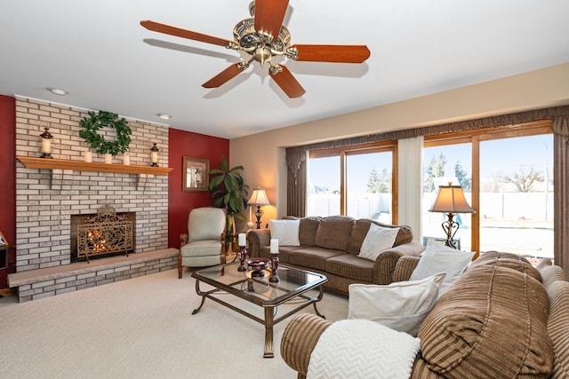 living room with carpet floors and a brick fireplace