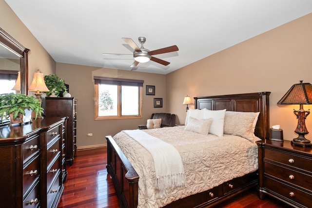 bedroom with ceiling fan and dark hardwood / wood-style floors