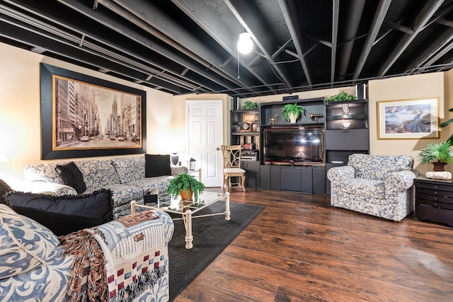 living room with dark hardwood / wood-style flooring