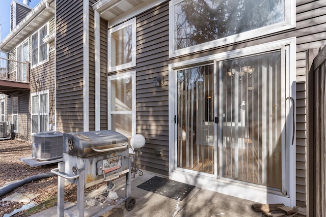 property entrance featuring central AC