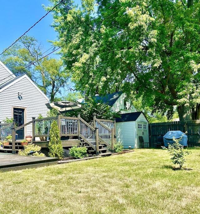 view of yard featuring a wooden deck