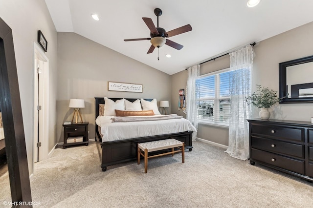 carpeted bedroom featuring ceiling fan and lofted ceiling