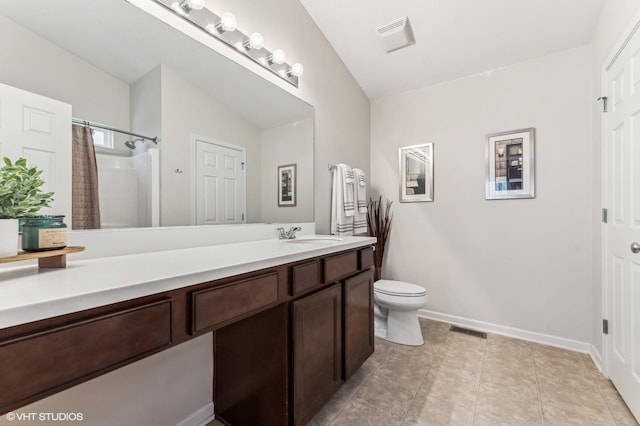 bathroom with toilet, vanity, lofted ceiling, and a shower with curtain