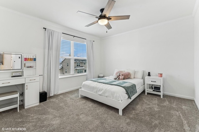 bedroom featuring crown molding, dark colored carpet, and ceiling fan