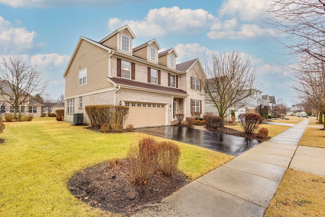 view of home's exterior with a lawn, driveway, cooling unit, an attached garage, and brick siding