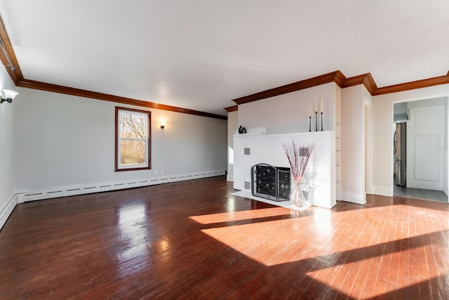 unfurnished living room with a baseboard heating unit, a brick fireplace, ornamental molding, and dark hardwood / wood-style flooring