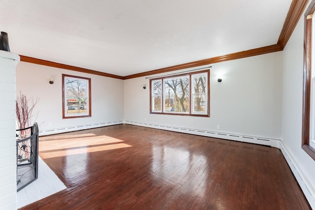 unfurnished living room with baseboard heating, ornamental molding, and hardwood / wood-style flooring