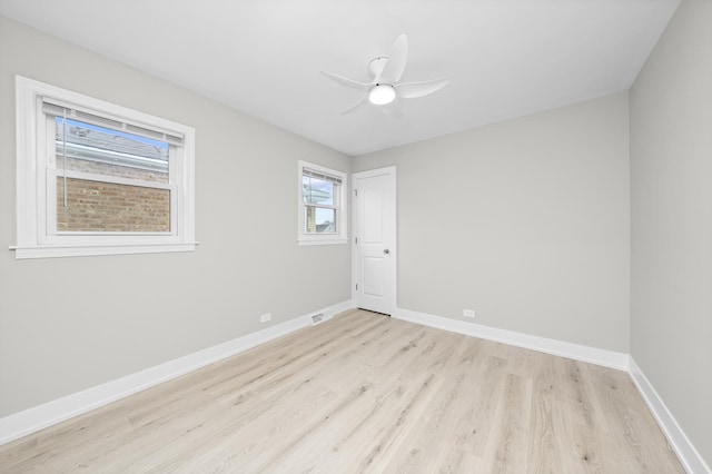 unfurnished room featuring ceiling fan and light hardwood / wood-style floors