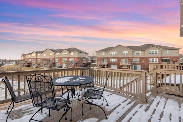 view of snow covered deck