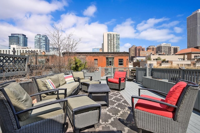 view of patio / terrace featuring an outdoor hangout area and a wooden deck