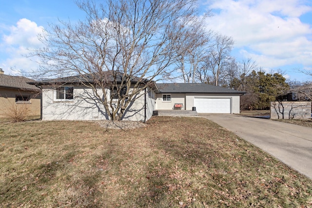 single story home featuring a garage and a front yard