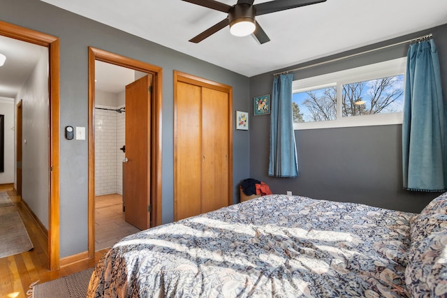 bedroom featuring a closet, ceiling fan, and light hardwood / wood-style flooring