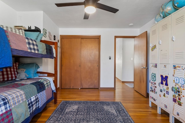 bedroom with hardwood / wood-style floors and ceiling fan