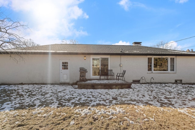 view of snow covered property