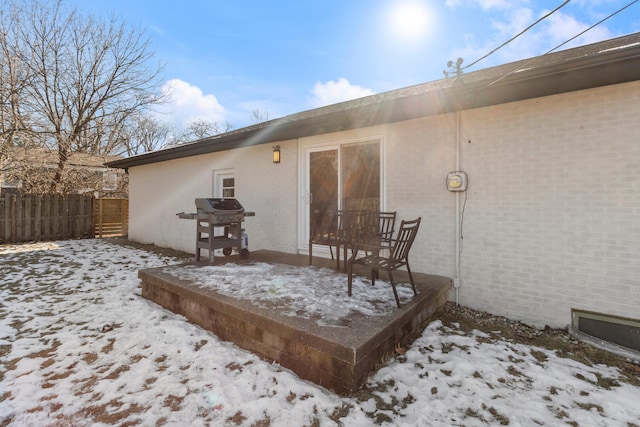 view of snow covered house