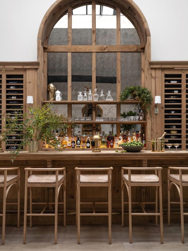 bar featuring hardwood / wood-style floors