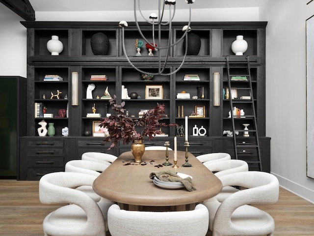 dining space featuring hardwood / wood-style flooring