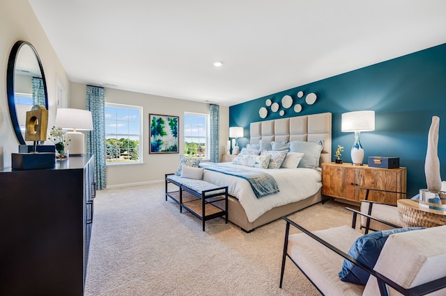 bedroom with light colored carpet