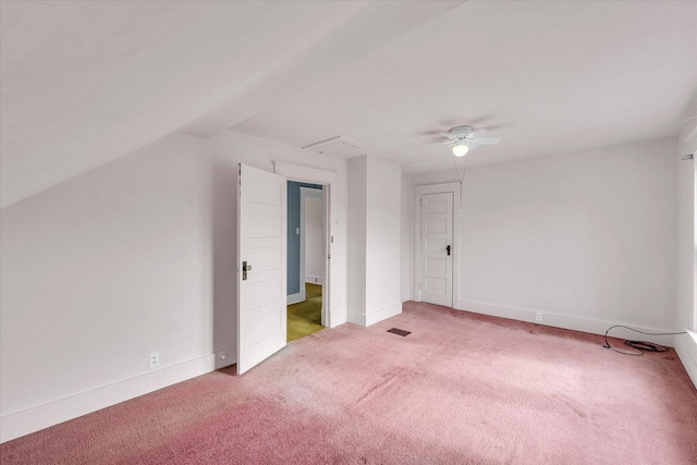 additional living space featuring ceiling fan and carpet