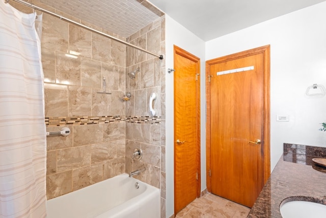 bathroom featuring vanity and shower / bath combo with shower curtain