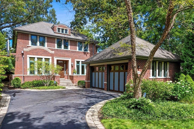 view of front of property with a garage