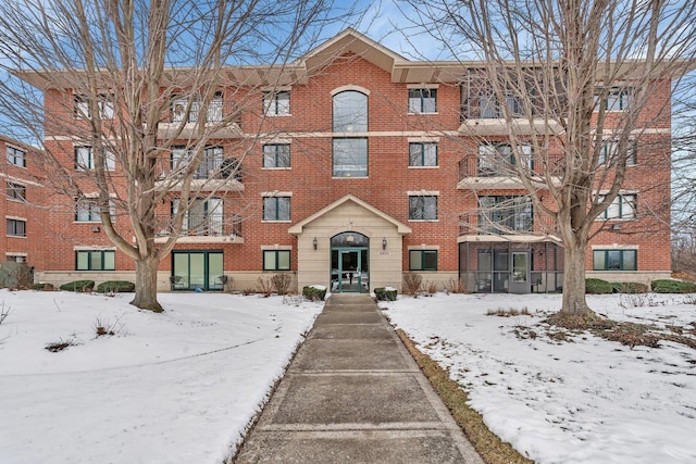 view of snow covered property