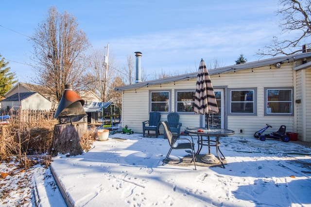 view of snow covered deck