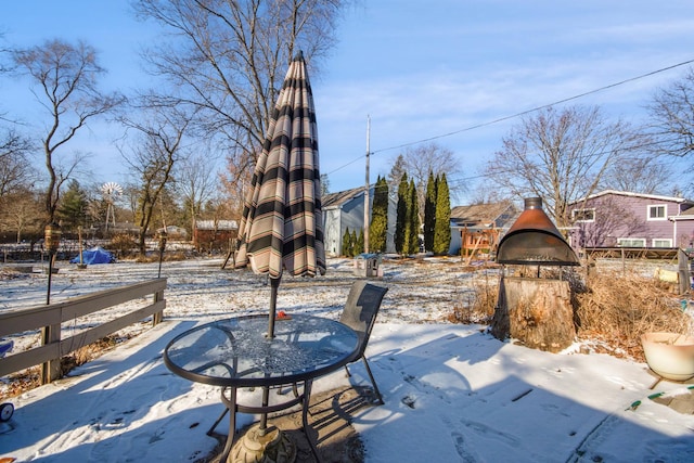 view of snow covered patio