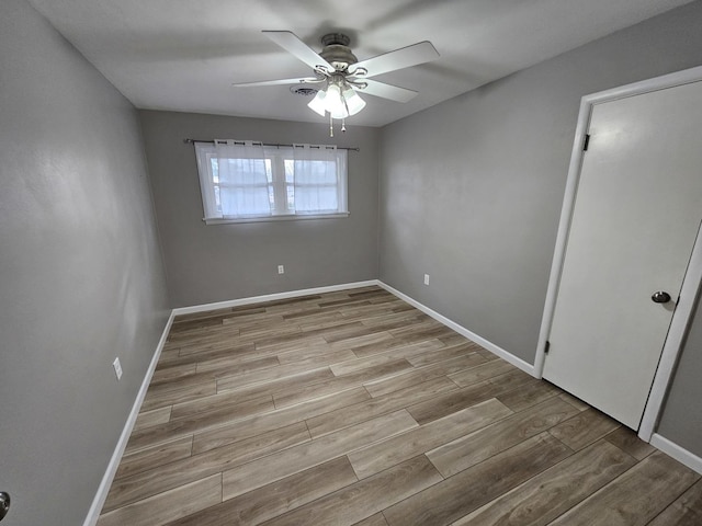 empty room with ceiling fan