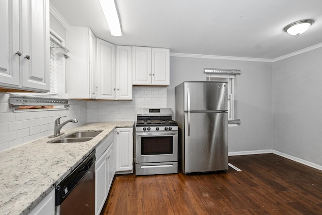 kitchen featuring white cabinetry, sink, stainless steel appliances, and dark hardwood / wood-style floors