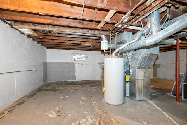 basement featuring heating unit and water heater