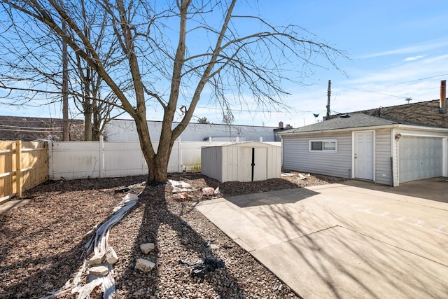 view of yard with a patio and a storage unit