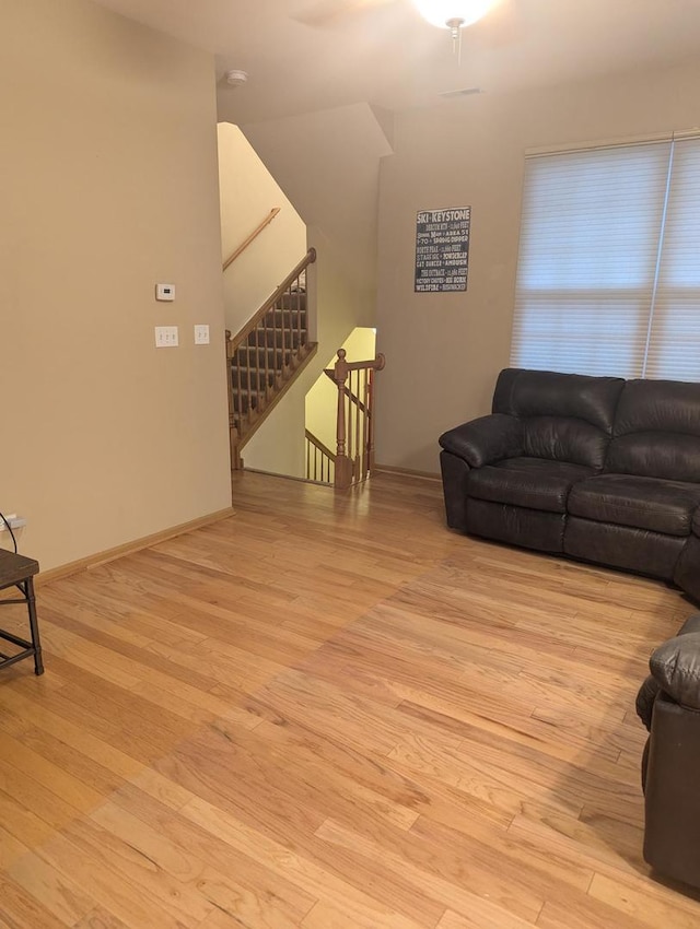 living room with light hardwood / wood-style floors