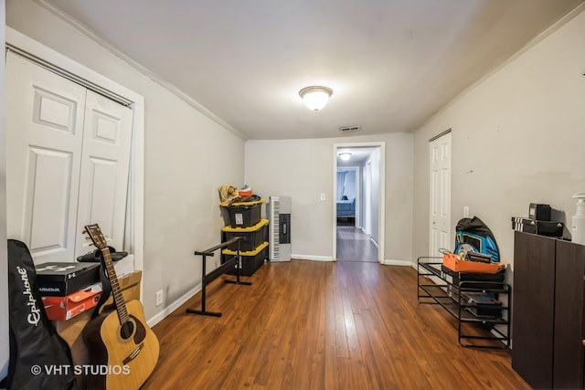 misc room with dark hardwood / wood-style flooring