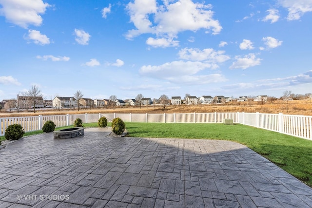 view of patio / terrace with a fire pit